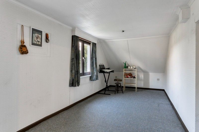 🏡 Uniek en authentiek pand vol karakter en mogelijkheden. Ruime woning, multifunctionele bijgebouwen en een charmante, omsloten tuin. foto 12