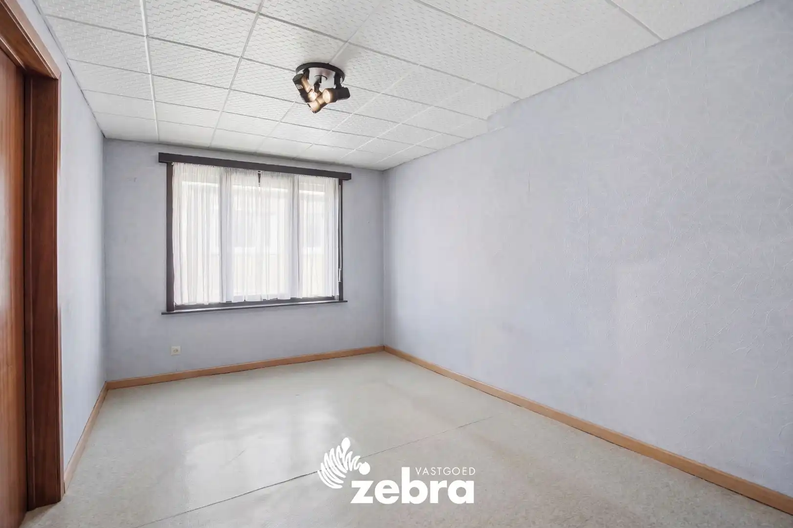 Op te frissen woning met veel potentieel, tuin en garage nabij het centrum van Tielt! foto 16