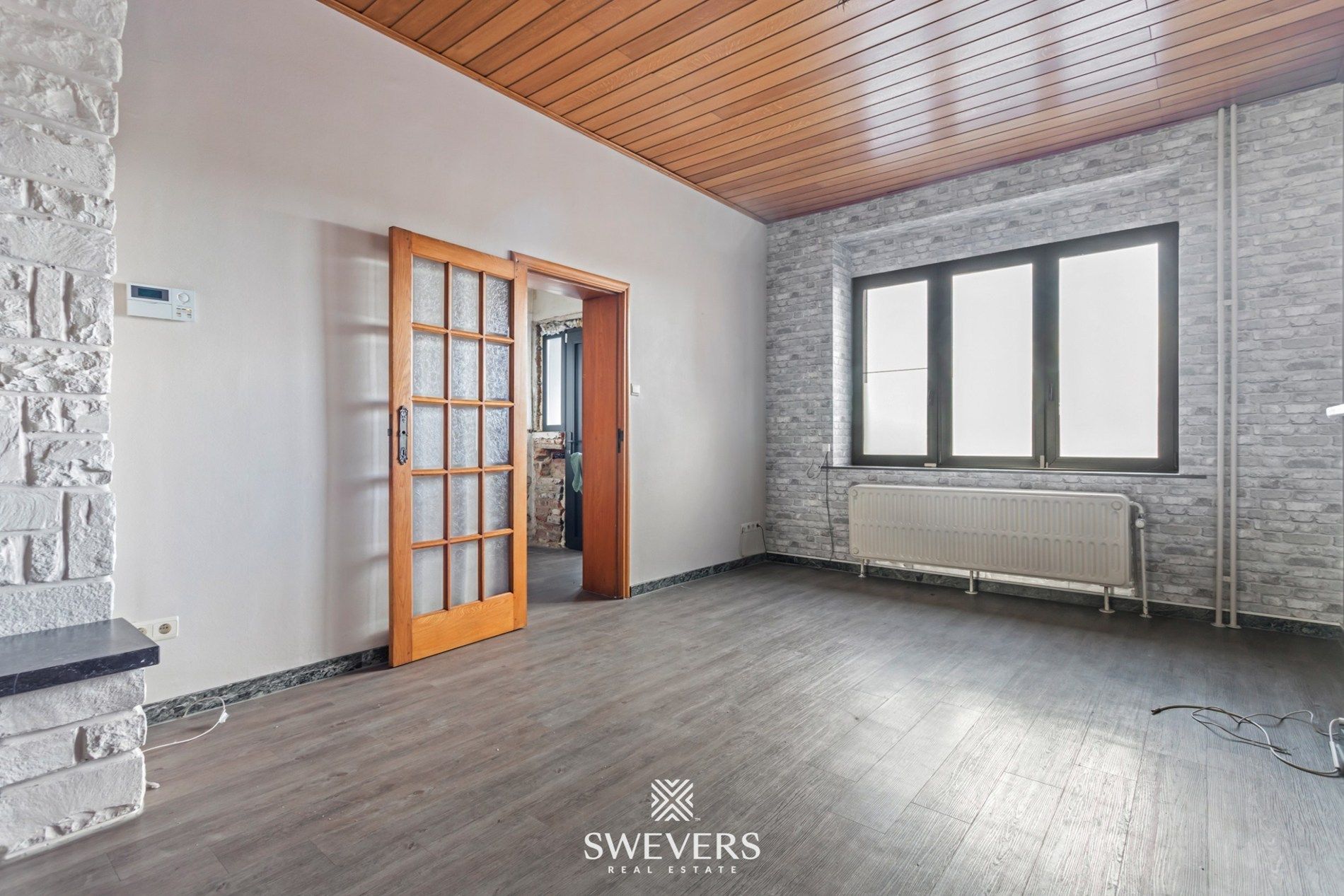 Ideale gezinswoning, instapklaar met ruime tuin en bouwgrond foto 7