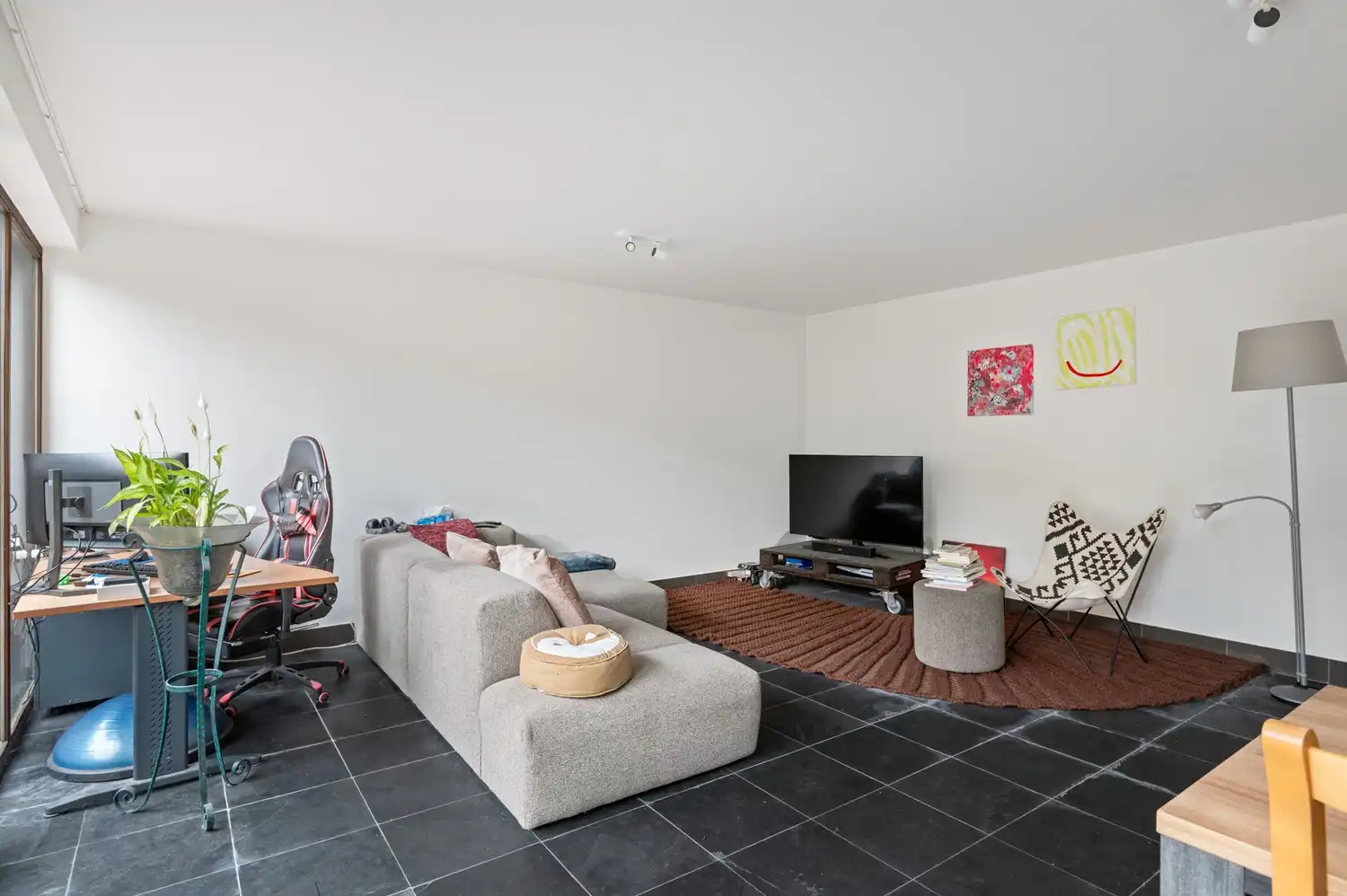 Gelijkvloers 2-slaapkamerappartement met tuin en garagebox foto 6