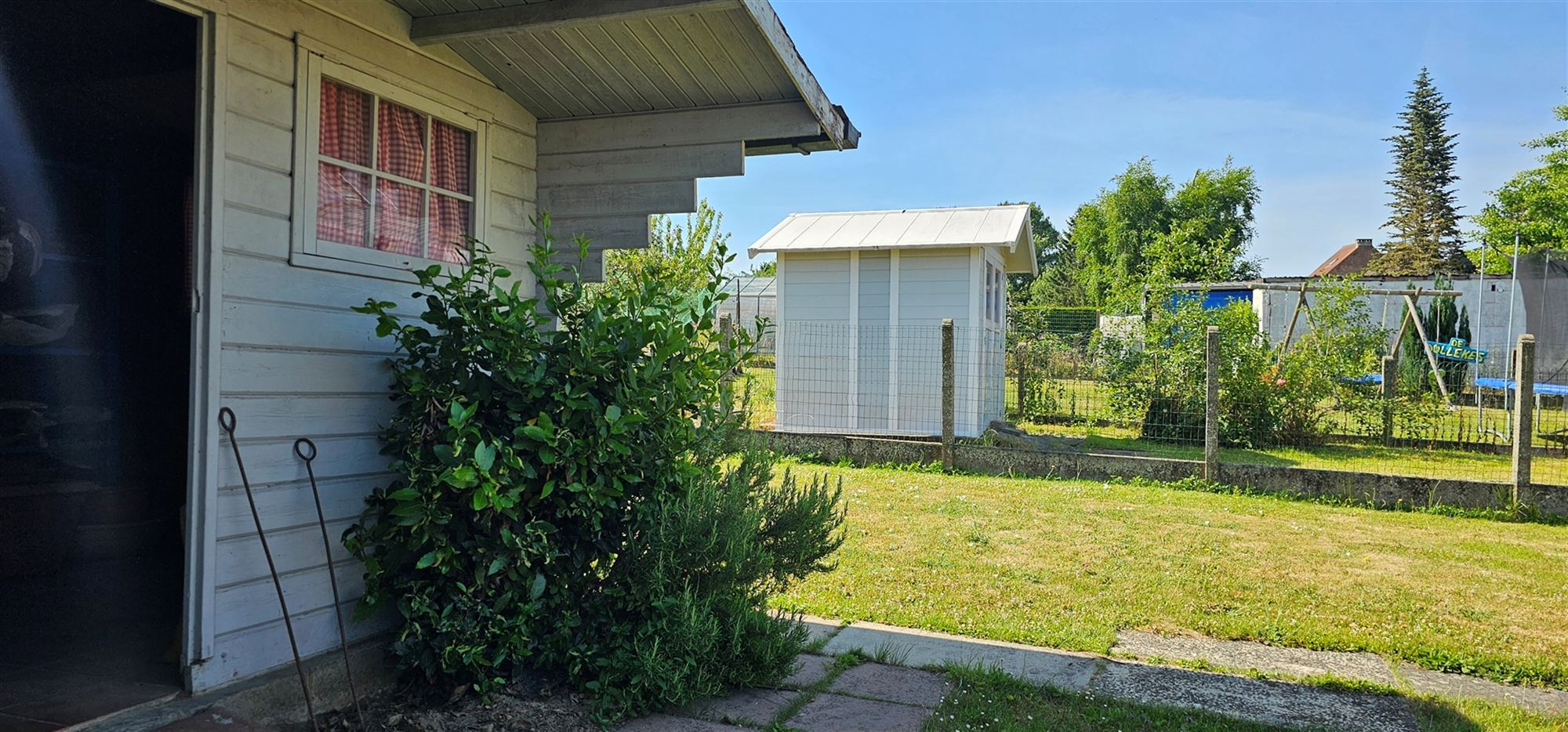 VERZORGDE WONING MET GROTE GARAGE & BOUWGROND foto 13