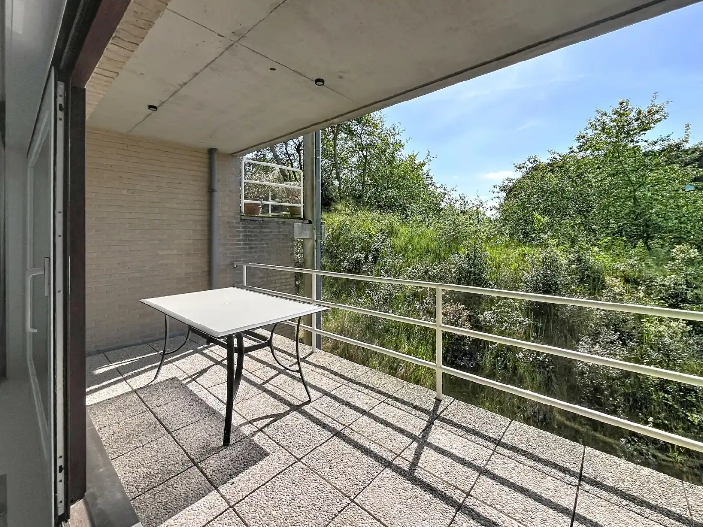 Ruim duplex appartement met 4 slaapkamers en 2 badkamers foto 12