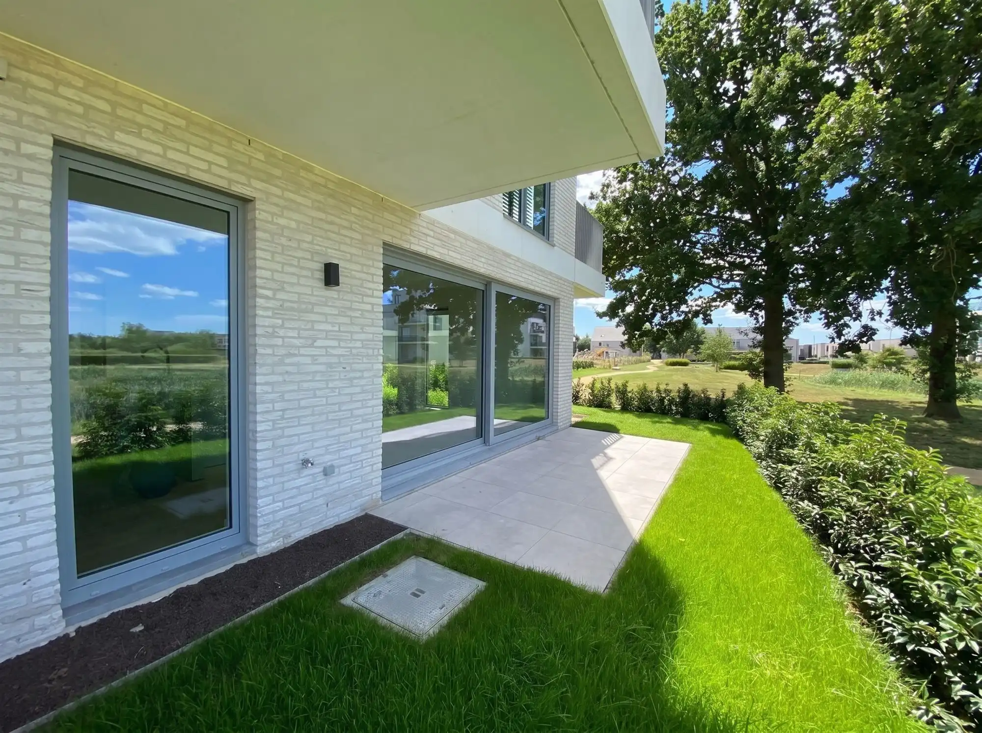 Gelijkvloers nieuwbouwappartement met garage en berging foto 11