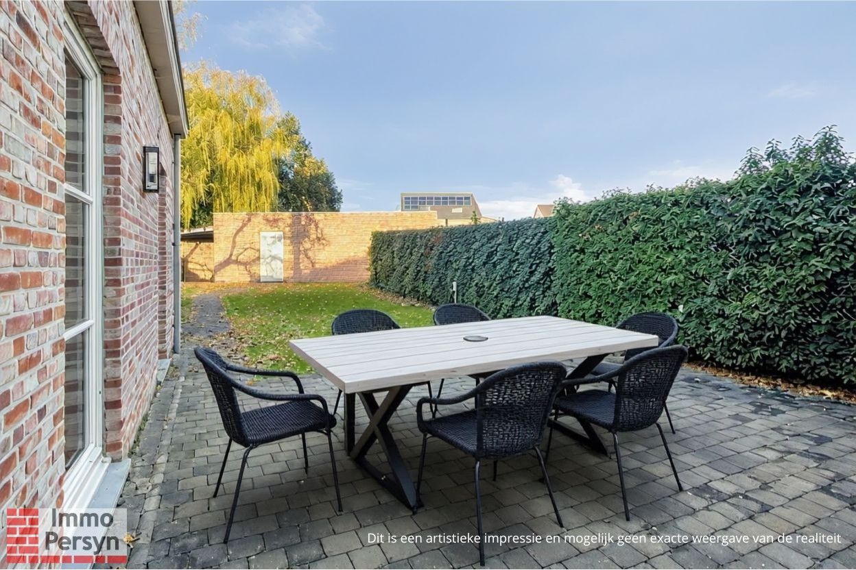 Ruim gelijkvloers appartement met tuin en 2 staanplaatsen. foto 30