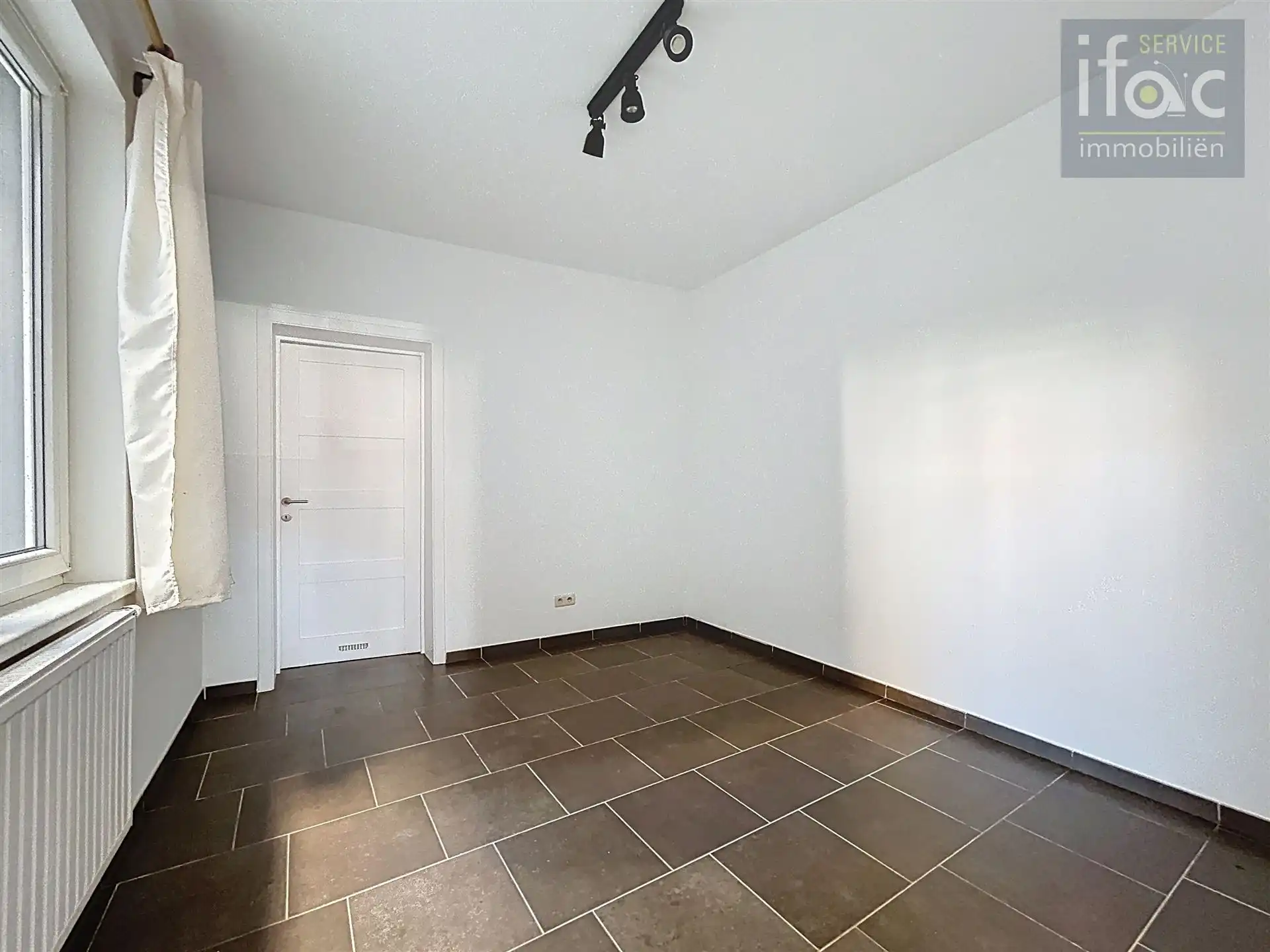 Gelijkvloers appartement met bergingszolder foto 5