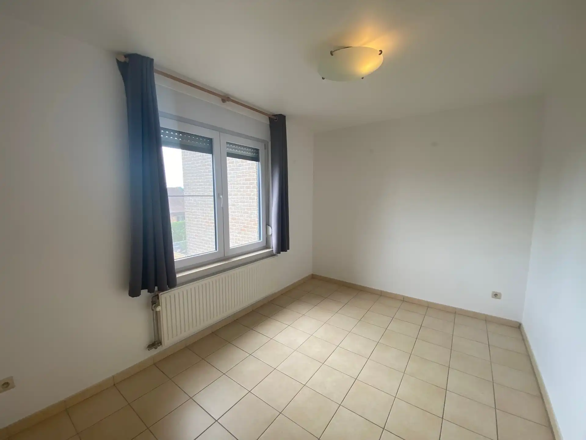 Ruime en lichtrijke woning met aangename west-geörienteerde tuin, gelegen in een rustige en doodlopende straat op wandelafstand van het centrum van Kortenberg. foto 15