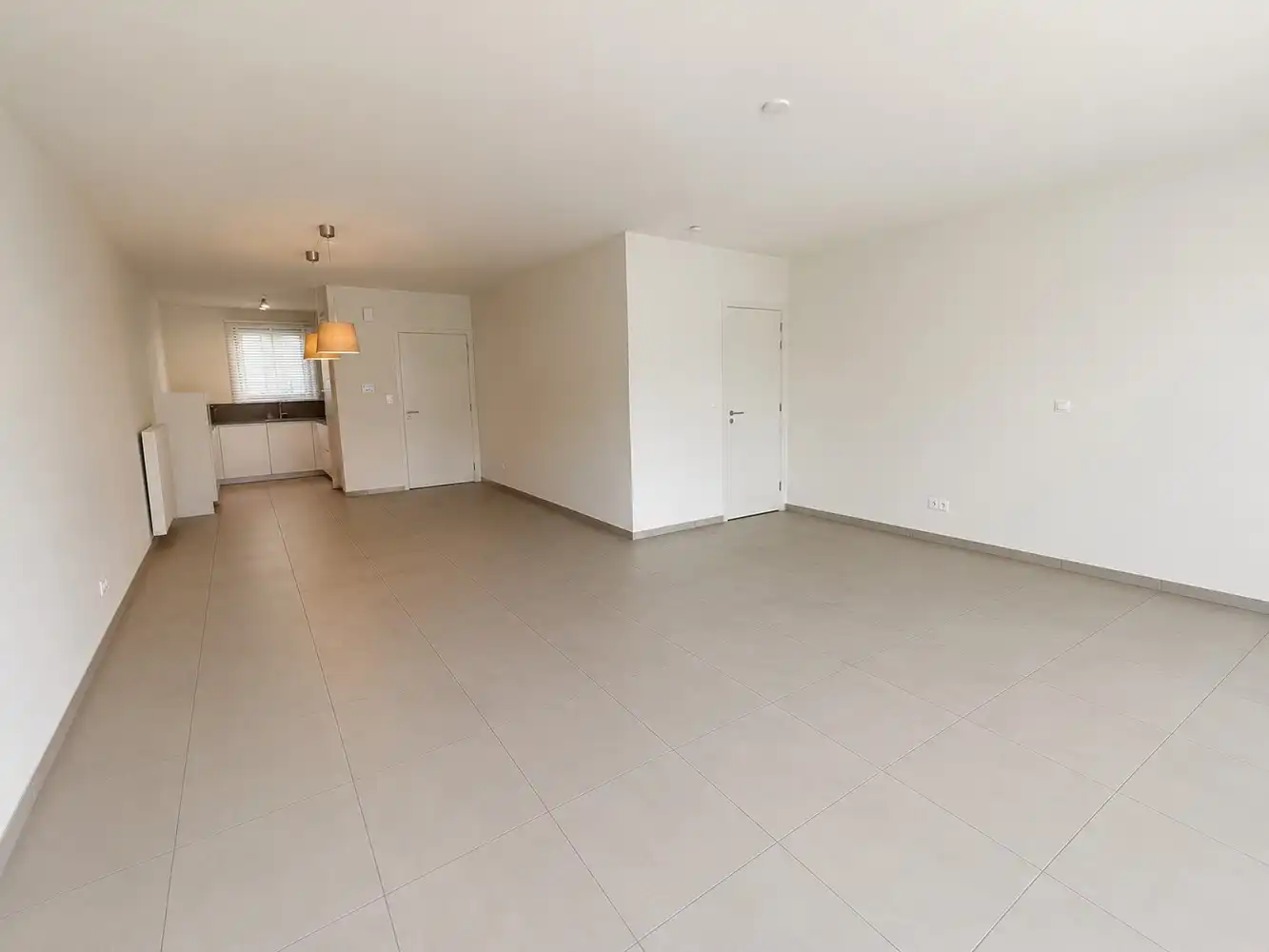 Moderne gezinswoning met 3 slaapkamers, tuin en garage in het hart van Zutendaal foto 2