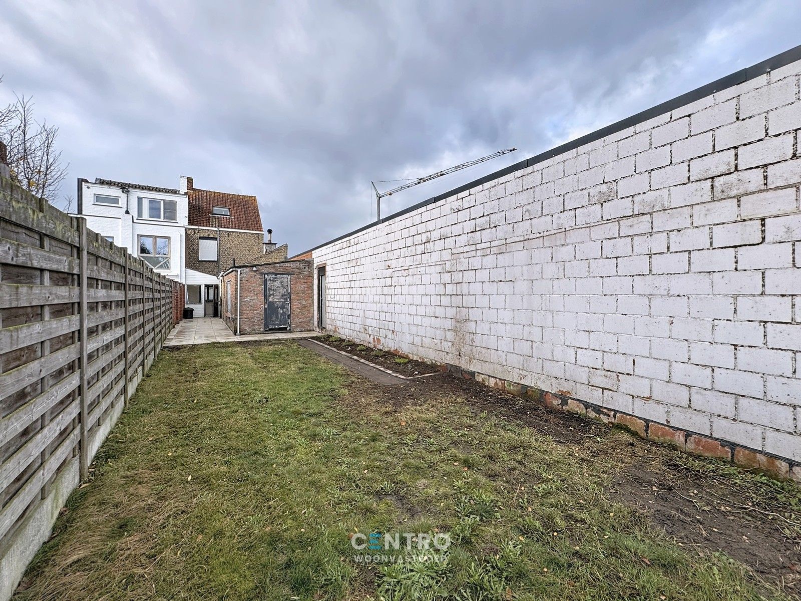 Op te frissen woning met 4 slpks én ZUIDger. tuin te Assebroek! foto 19