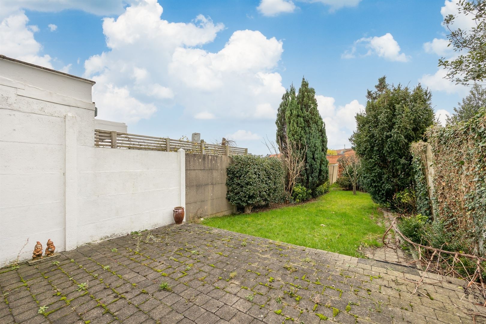 Charmante woning opgedeeld in 2 wooneenheden met grote tuin foto 11