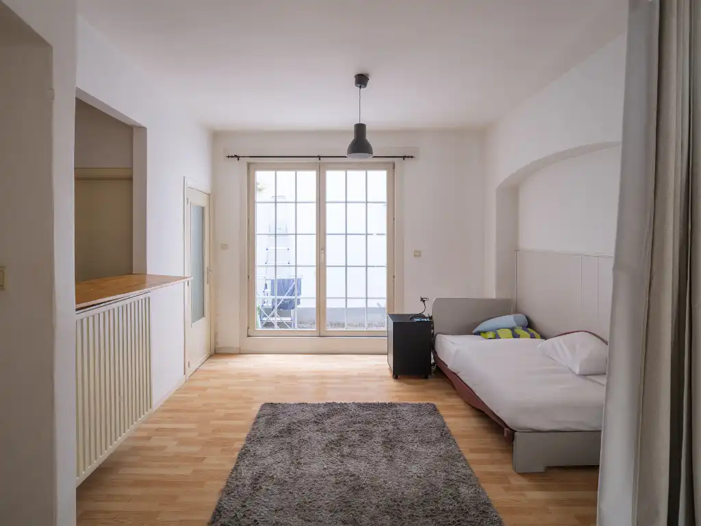 Opbrengsteigendom bestaande uit verschillende studio's en éénslaapkamer­appartementen in het centrum van Gent. foto 4