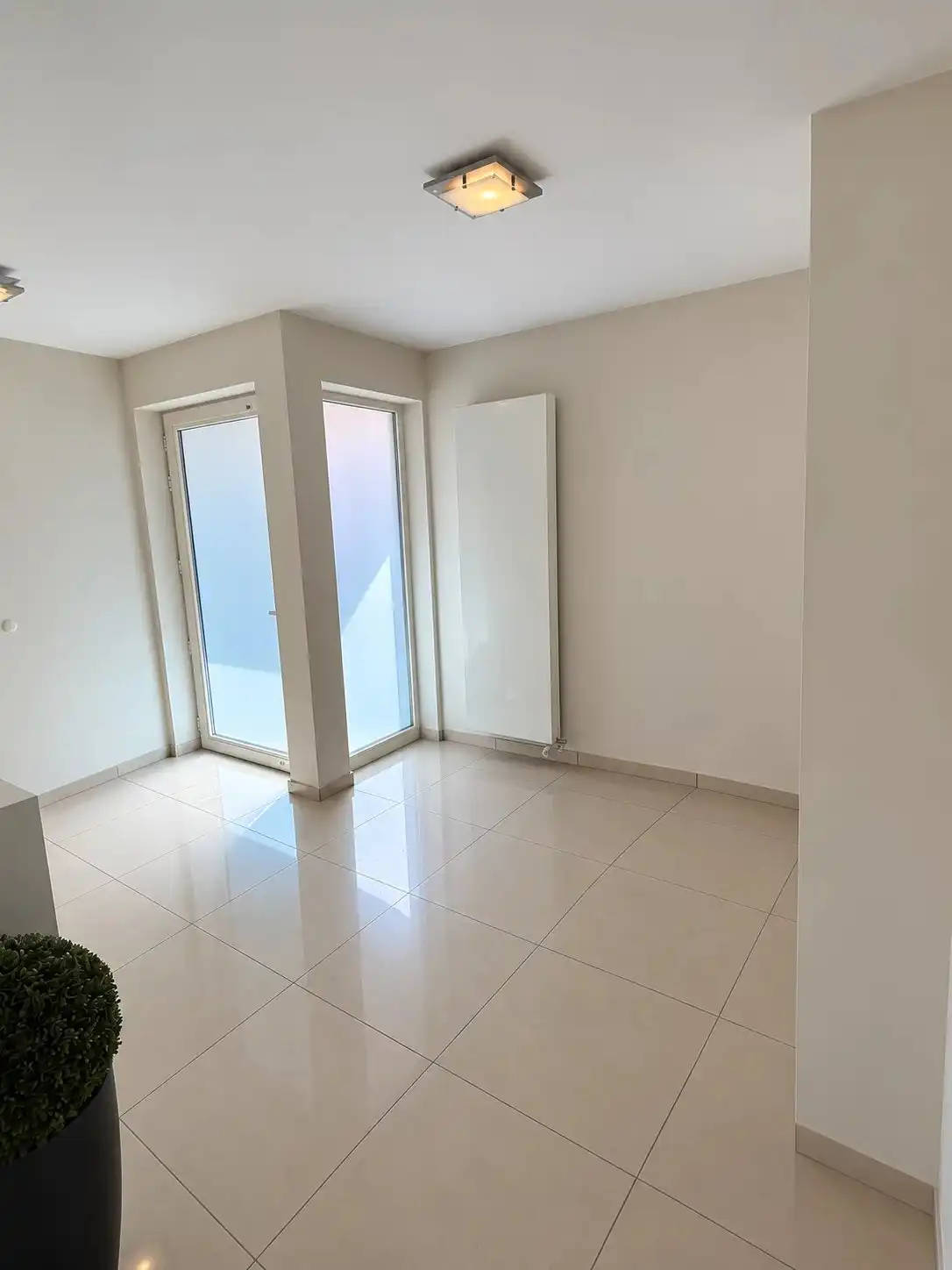Te Huur : Verzorgde en ruime woning met 2 slaapkamers en garage in centrum Bilzen foto 2