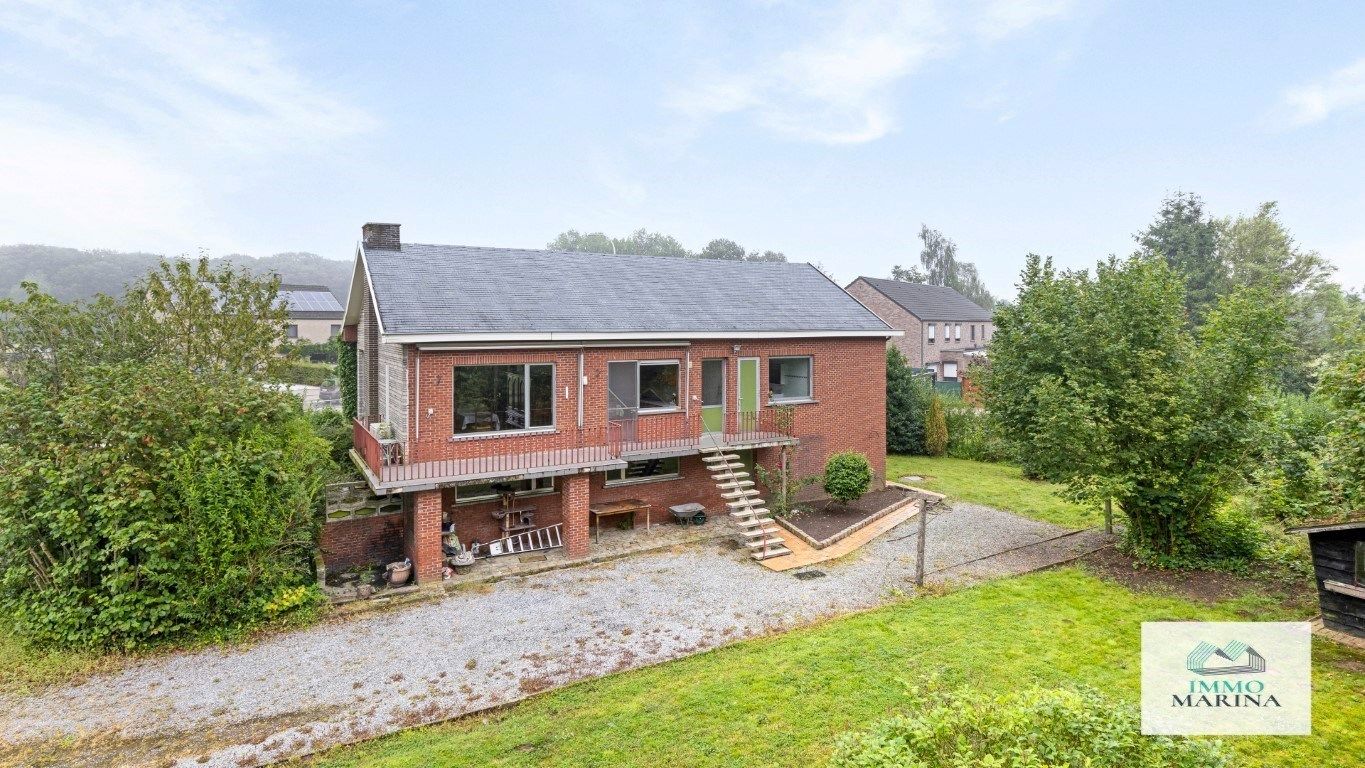 Woning met W-tuin circa 41a en volledige kelder. foto 4