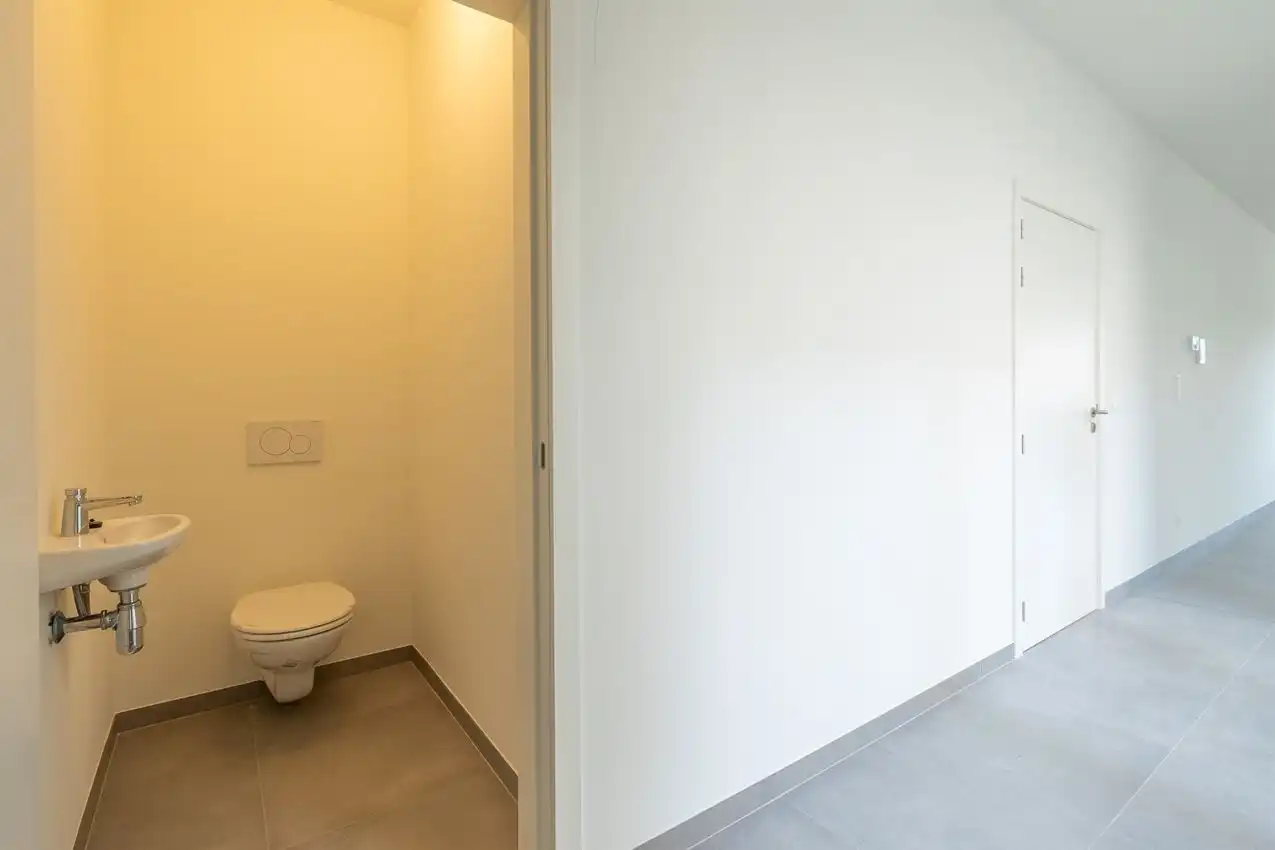 Nieuwbouwappartement met 1 slpk, autostaanplaats en terras foto 12