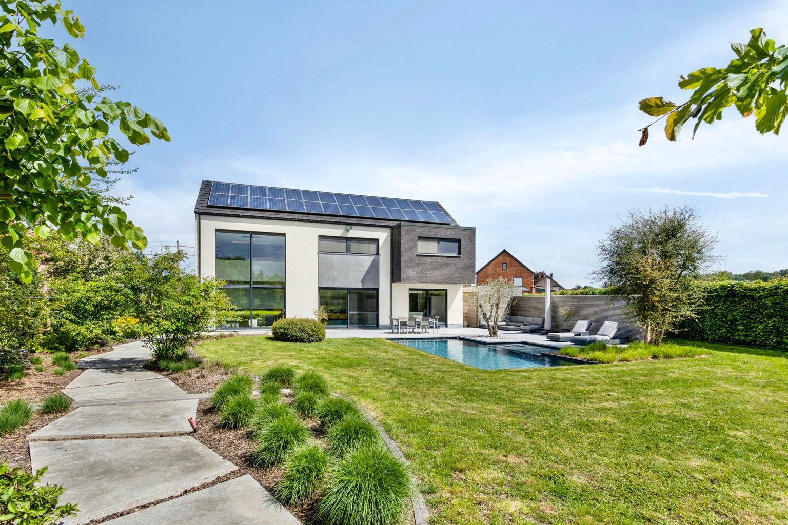 Mooie stijlvolle woning met tuin en achterliggend weiland foto 25