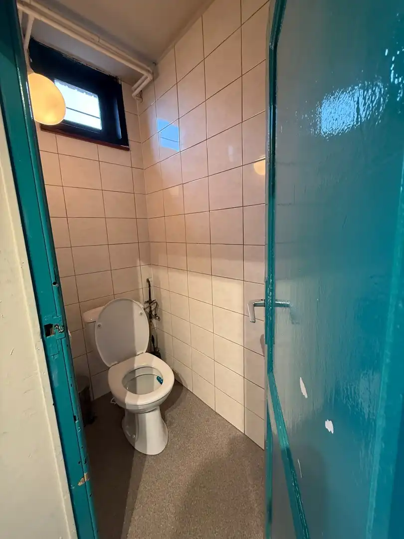 Opbrengsteigendom bestaande uit 2 halfopen woningen met garage en tuin te Hechtel. foto 24