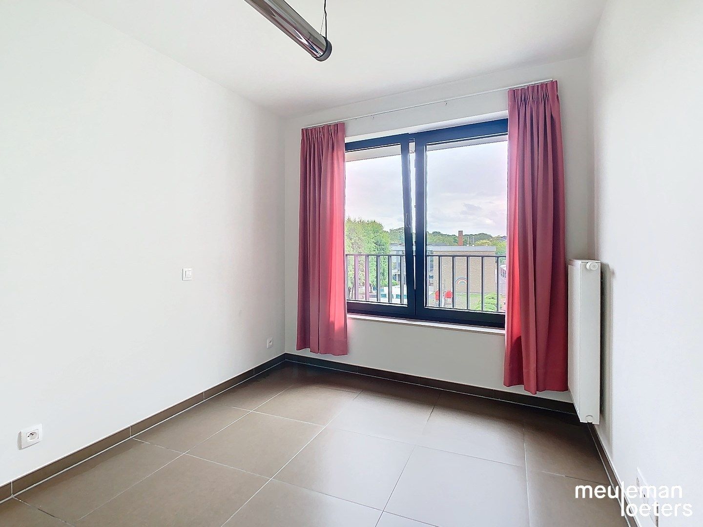 Centraal gelegen appartement met parking foto 7