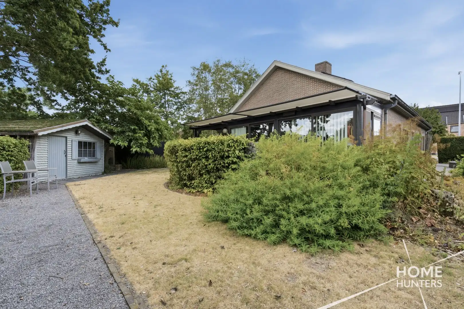 Alleenstaande woning met prachtige tuin en tal van extra troeven in een rustige wijk te Wervik foto 5