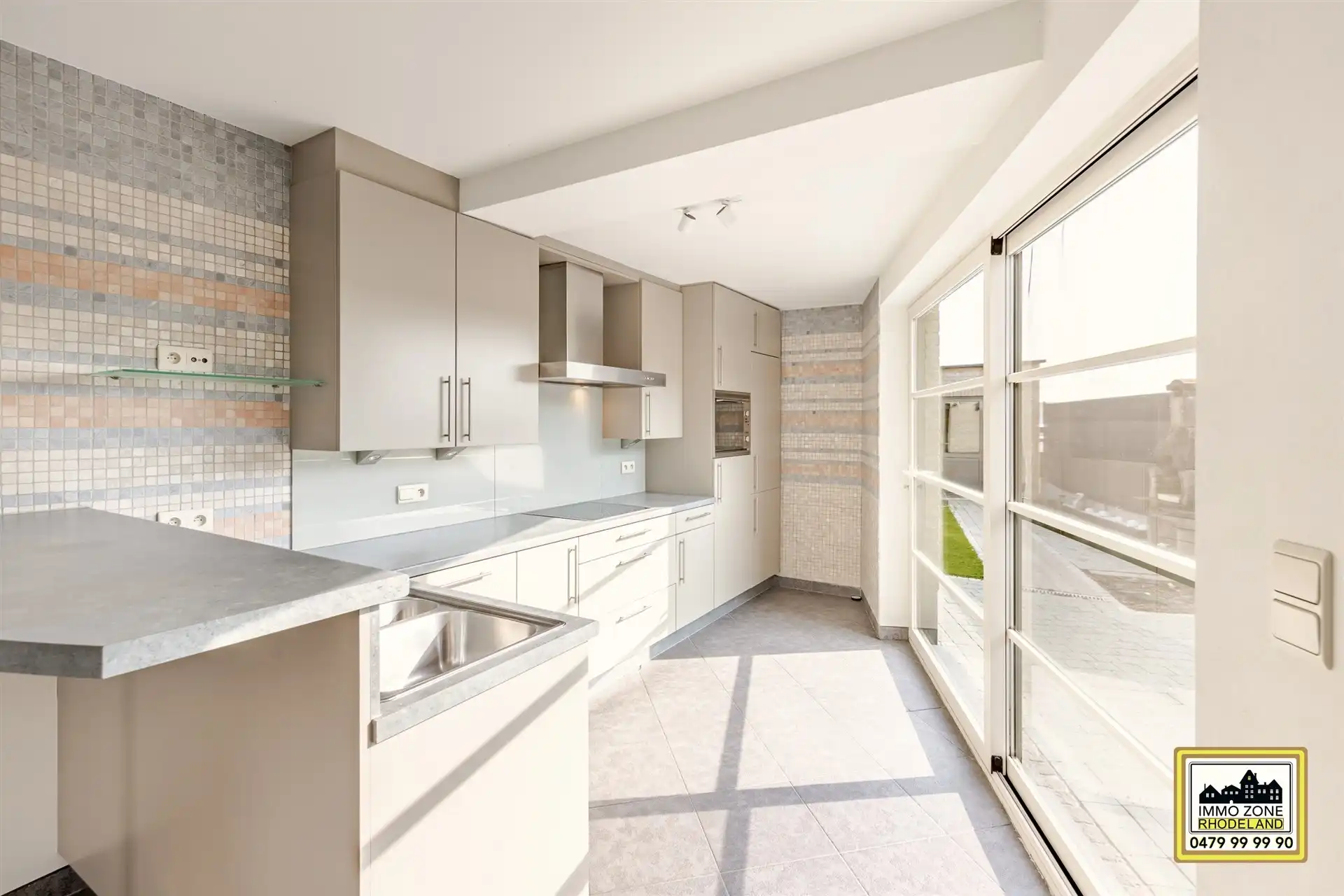 Prachtig gelijkvloers appt met 2 tot 3 slpks en leuke tuin foto 12