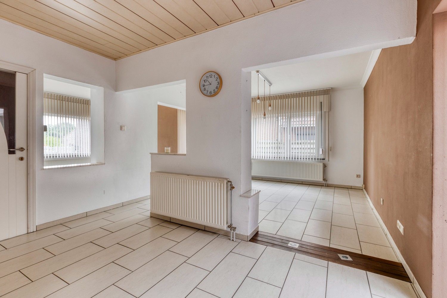 Halfopen gezinswoning met drie slaapkamers (mogelijkheid tot 4), grote tuin en zonnepanelen! foto 11