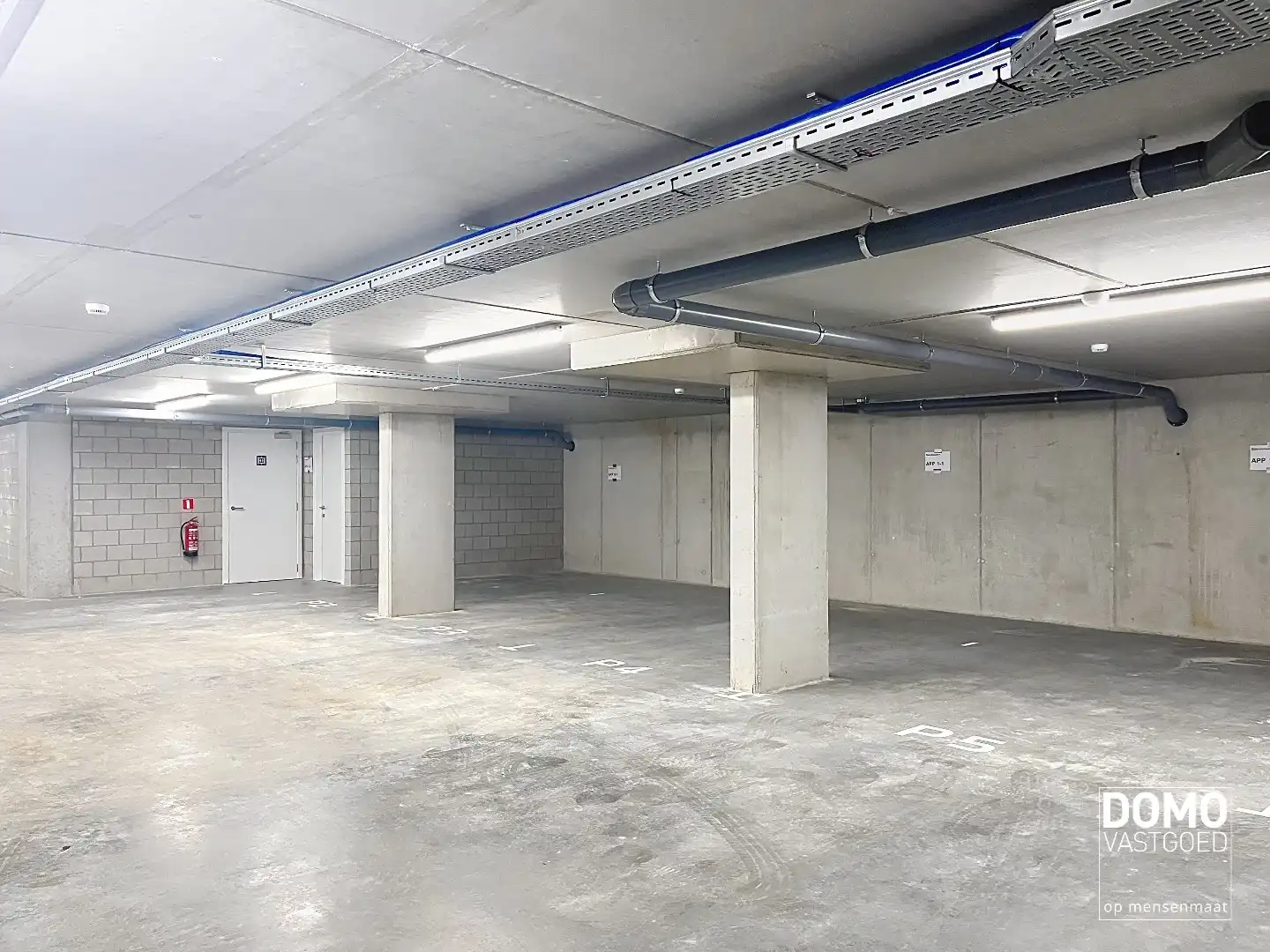 ONDERGRONDSE AUTOSTANDPLAATS TE HUUR IN CENTRUM KERMT (RESIDENTIE DE DRIESKENS) foto 2