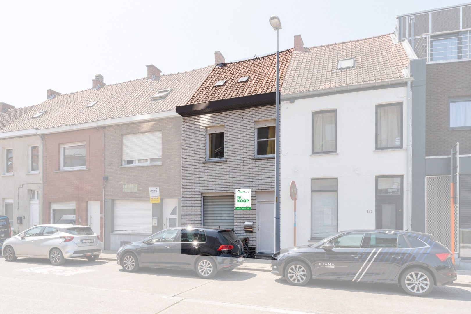 Centrale rijwoning met drie slaapkamers en terras in hartje Roeselare foto 19