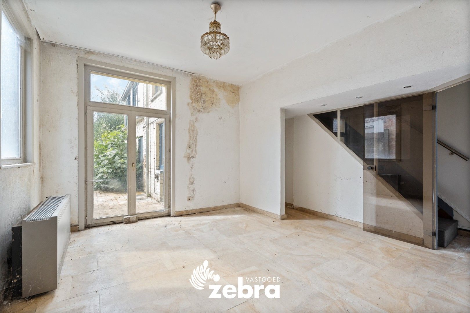 Te renoveren woning met 5 slaapkamers en veel potentieel in Sint-Michiels! foto 6