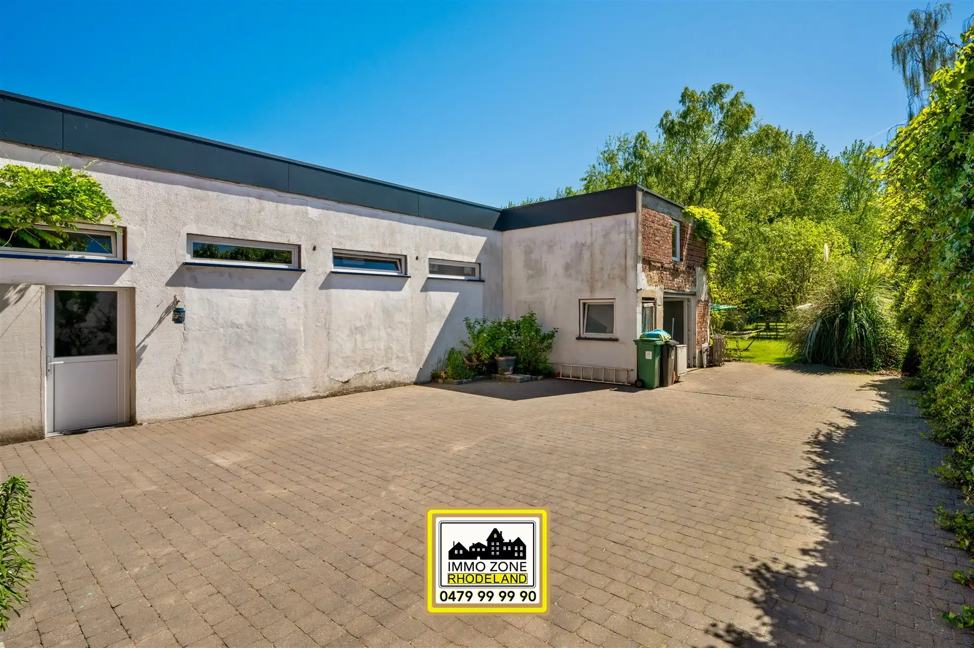 Ruime woning met multifunctioneel bijgebouw en grote tuin foto 28