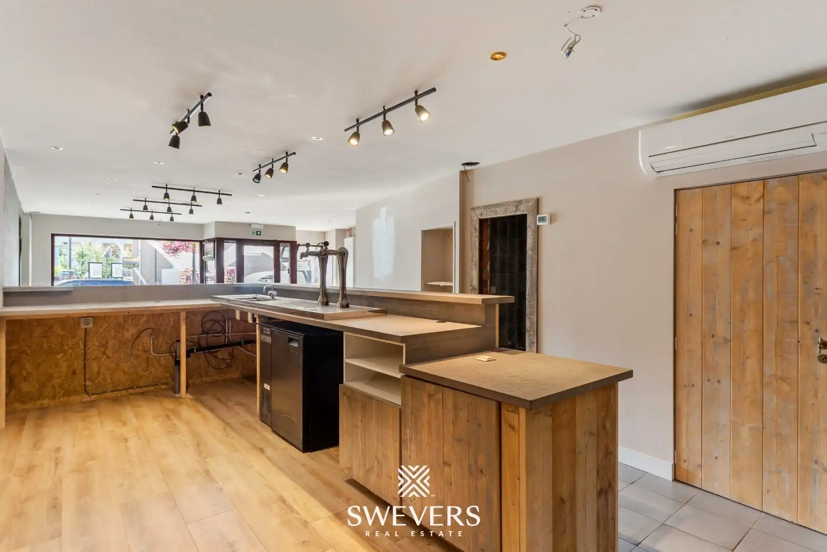 Unieke woon- en handelscombinatie te Lummen centrum foto 7