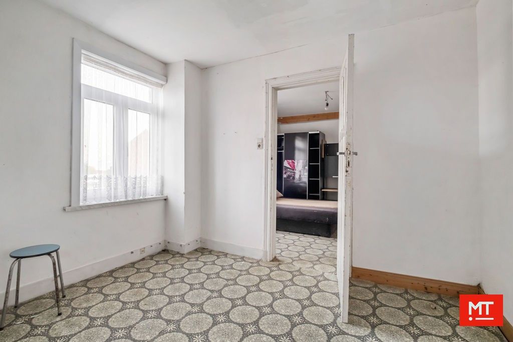 Te renoveren alleenstaande woning in de dorpskern van Wulvergem (Heuvelland) foto 10