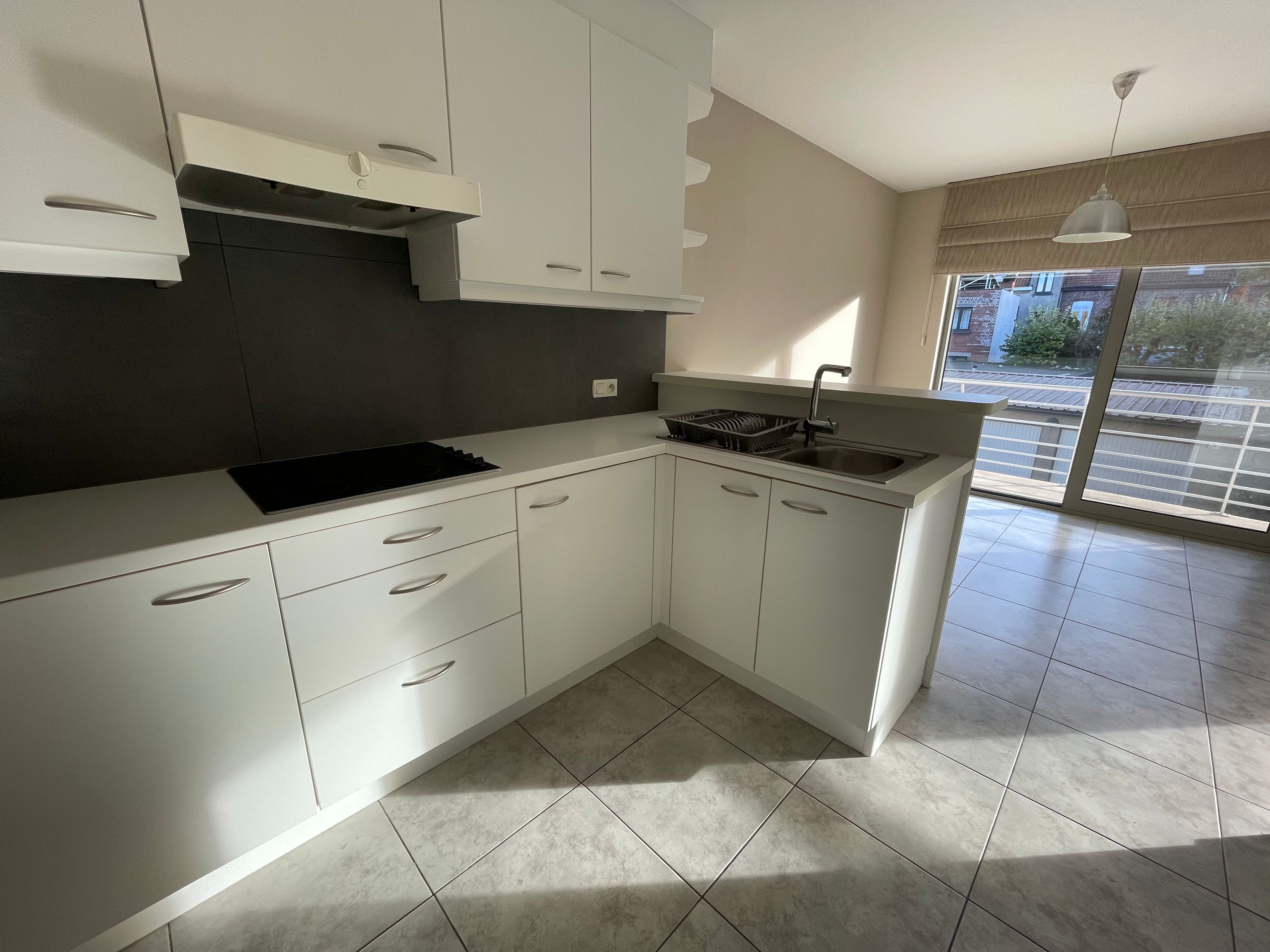 ruim instapklaar twee slaapkamer appartement met groot zongericht terras & gelijkvloerse garage foto 21