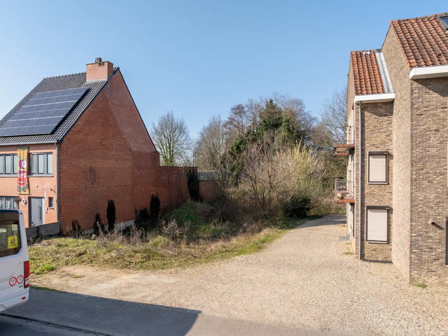 Bouwgrond voor halfopen bebouwing in het centrum van As  foto 3