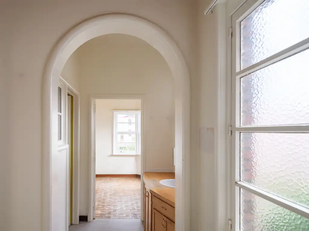 Uitzonderlijk aanbod aan het Miljoenenkwartier - Bijzonder karaktervolle, op te frissen, art-déco woning met fenomenale stadstuin nabij het Paul De Smet de Naeyerpark. foto 11