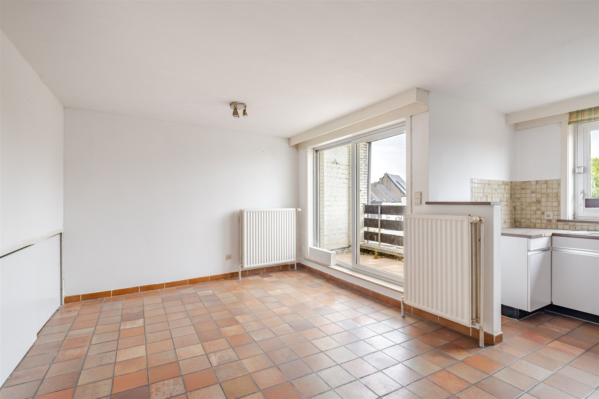 Opbrengsteigendom bestaande uit 2 appartementen + 2 gelijkvloerse autostaanplaatsen foto 3