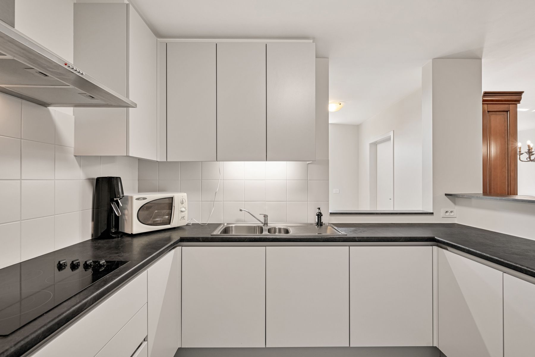 Ruim kwalitatief appartement met tuintje en 2 staanplaatsen! foto 11