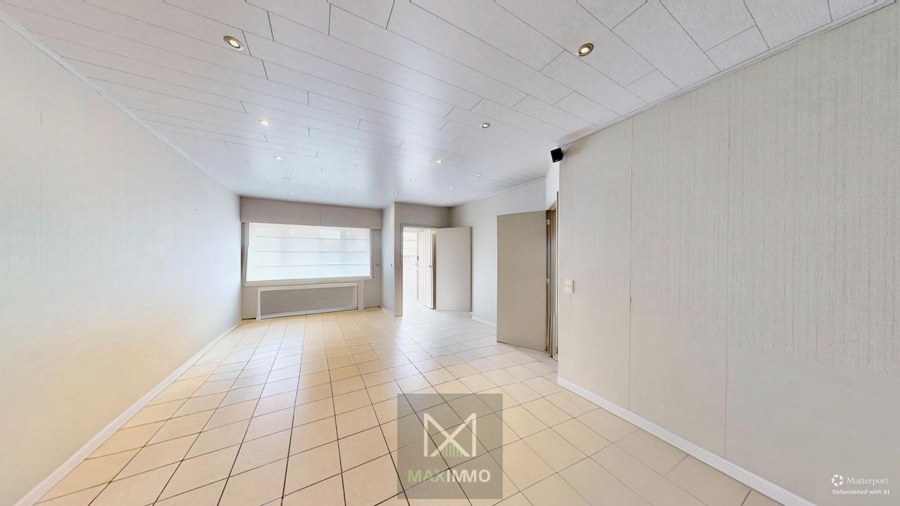 Instapklare, lichtrijke gezinswoning met grote tuin te Menen foto 3