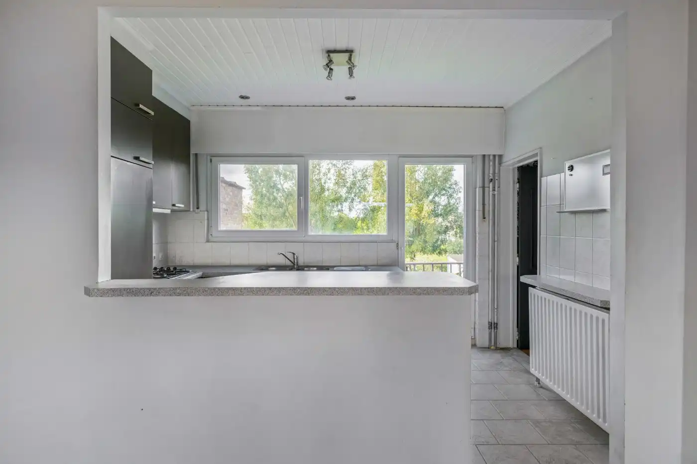 Ruime, instapklare bel-etagewoning met 3 slpk., inpandige garage en tuin foto 7