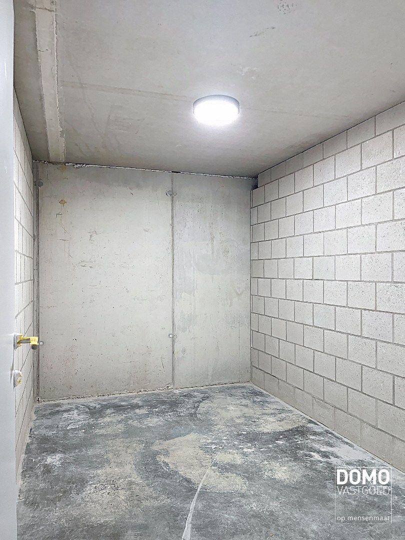 NIEUWBOUWAPPARTEMENT MET 2 SLAAPKAMERS, RUIM TERRAS, 2 AUTOSTANDPLAATSEN EN KELDERBERGING TE KERMT foto 18