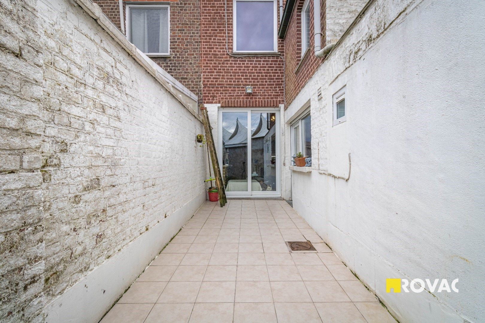 Rijwoning met 2 slaapkamers (mogelijks 3) en koer foto 13