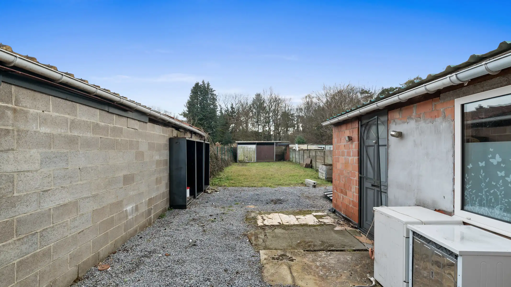 Deels te renoveren starterswoning met diepe tuin in groene, rustige omgeving foto 20