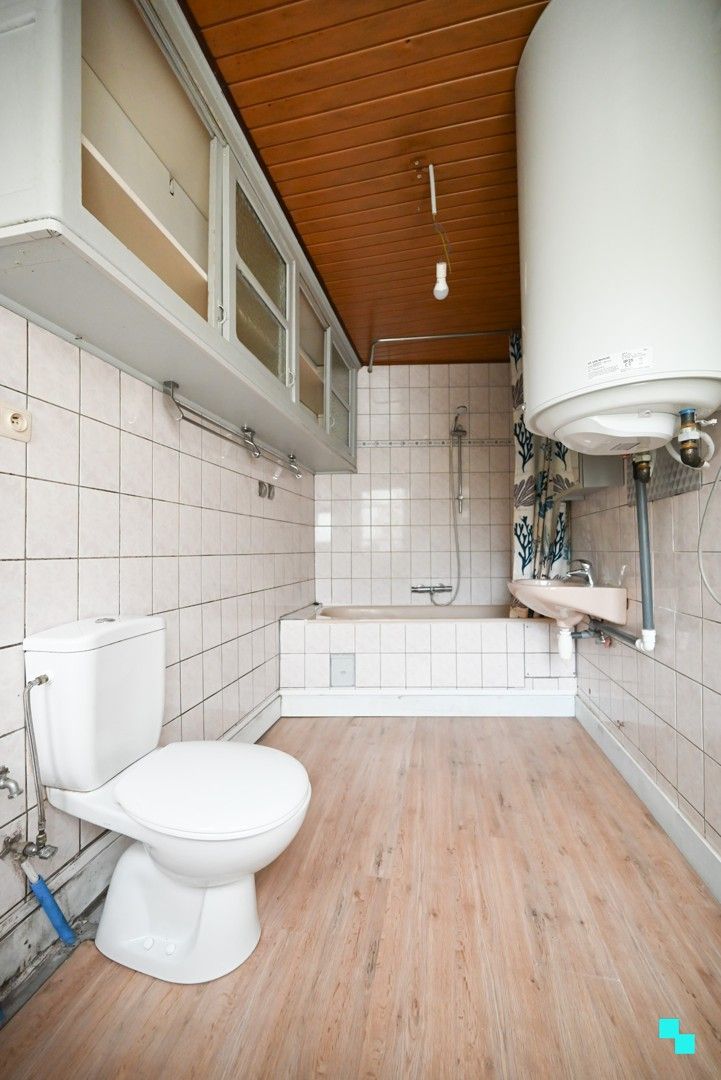 Centraal en gunstig gelegen te renoveren woning foto 10