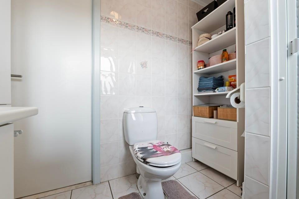 ENERGIEZUINIGE GEZINSWONING MET GARAGE VLAKBIJ HET CENTRUM VAN SINT-TRUIDEN foto 24