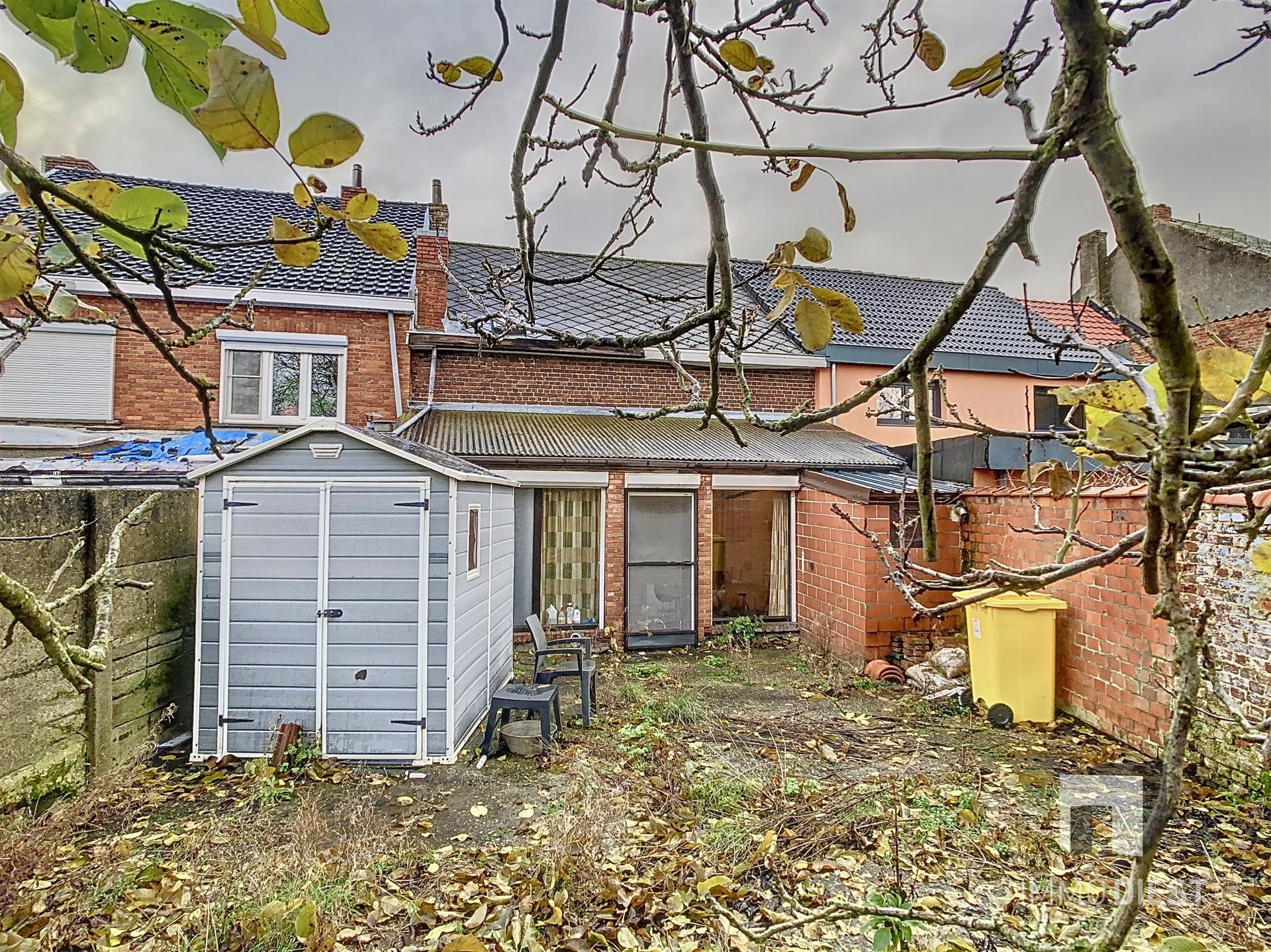 Te renoveren rijwoning met toffe tuin op een perceel van 4 are in het hart van Zichem. foto 3