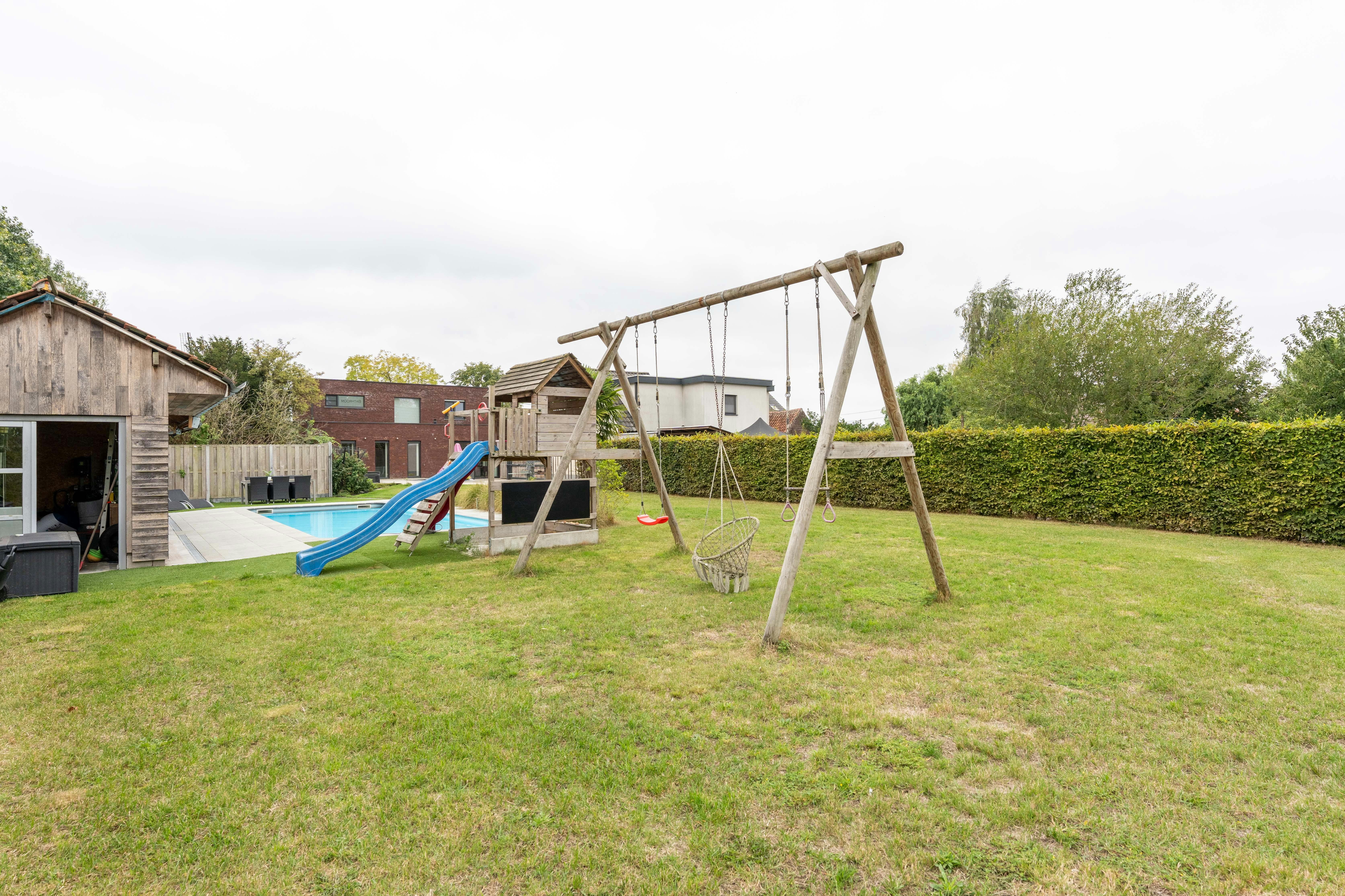 Moderne villa met zwembad en atelier te koop in Evergem foto 22