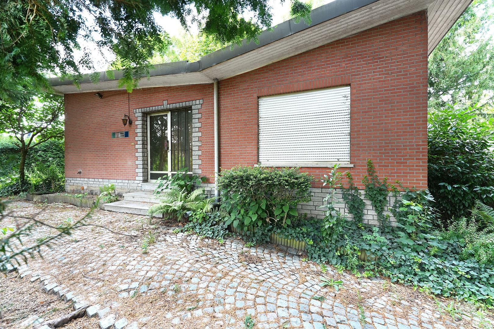 Laagbouw met grote tuin zonder renovatieplicht! foto 14