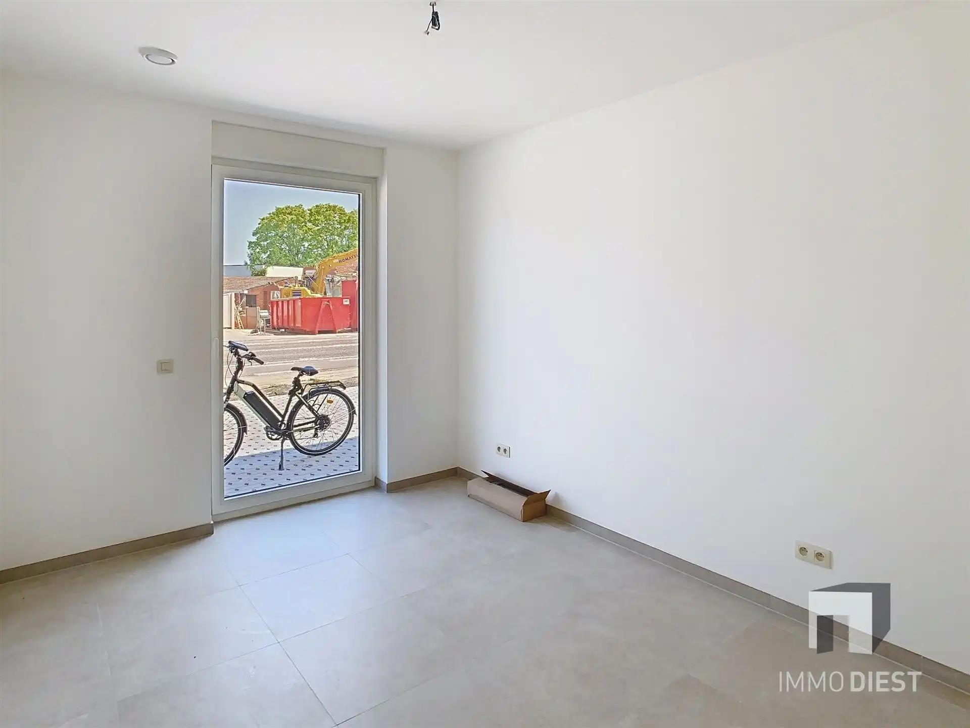 Gelijkvloers appartement met terras en tuintje foto 15