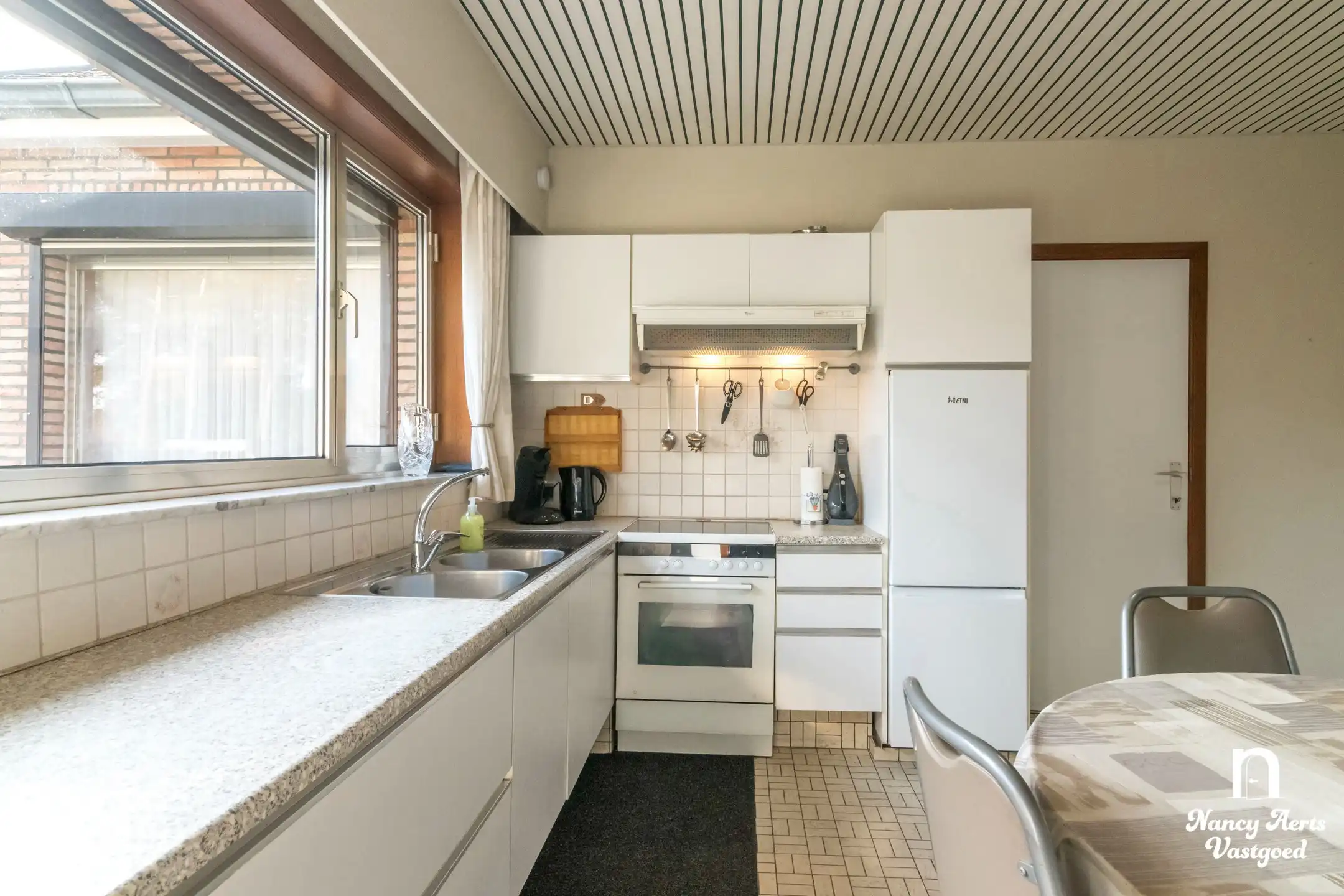 Goed onderhouden gezinswoning met grote tuin foto 17