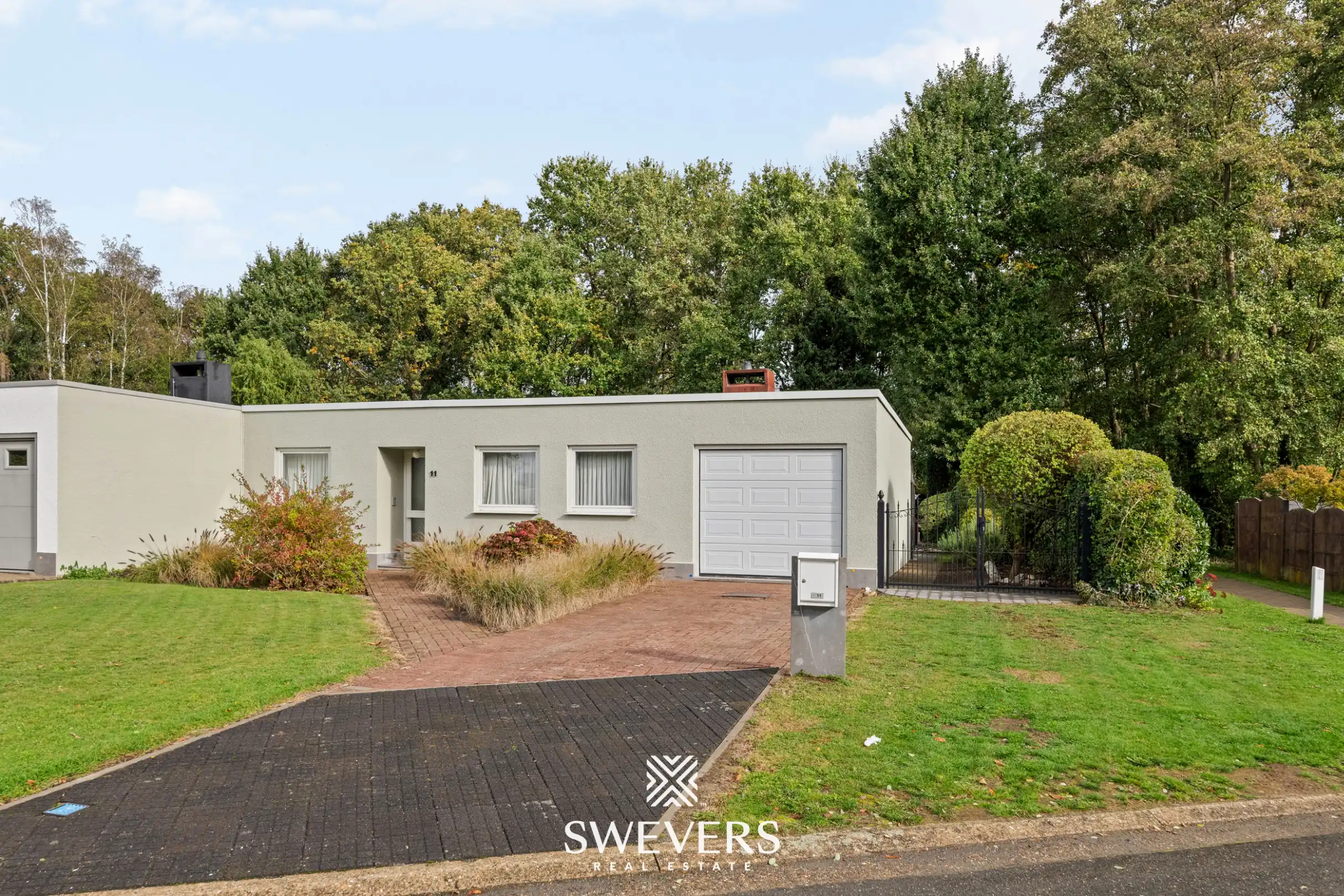 Karaktervolle gelijkvloerse woning met 3 slaapkamers, veranda en tuin in Heusden-Zolder foto 26