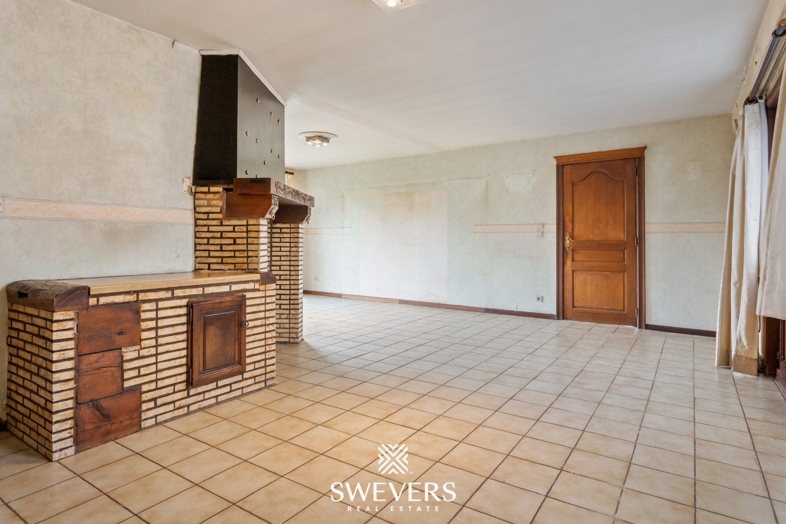 Te renoveren woning met veel potentieel op toplocatie te Diepenbeek foto 5