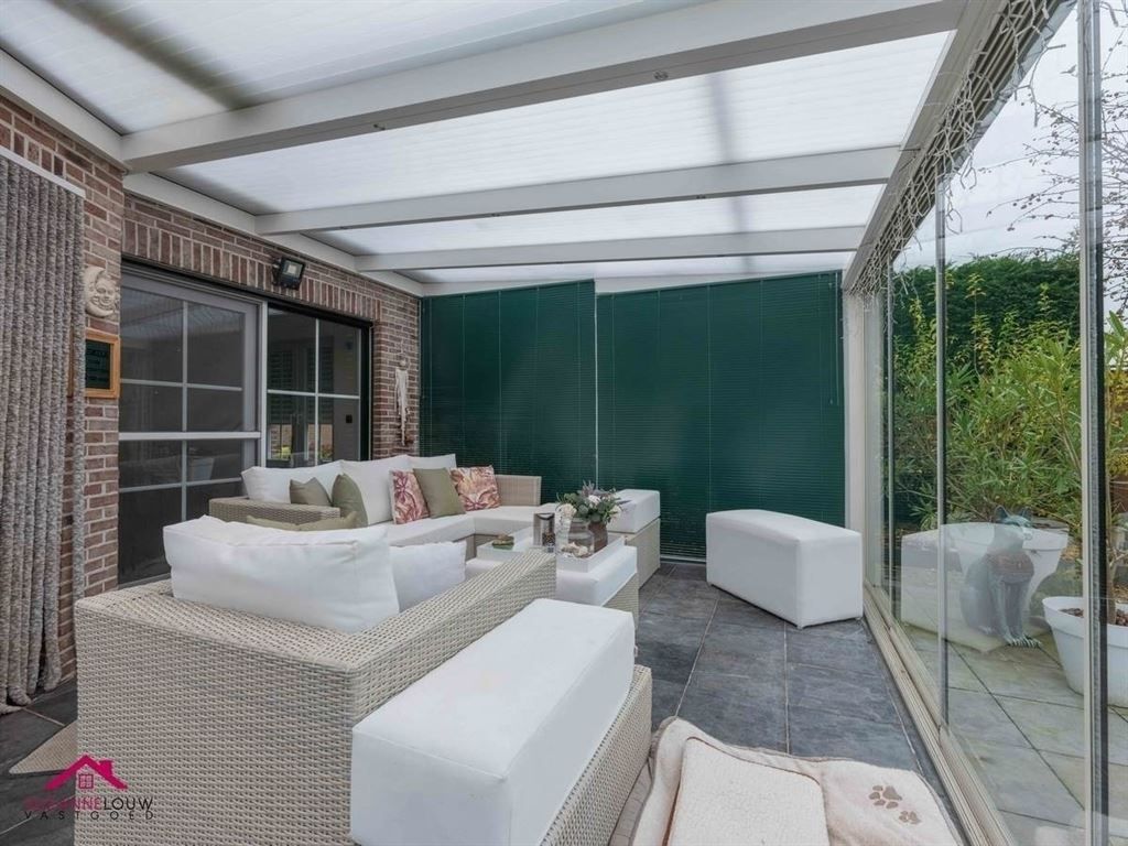 Stijlvolle vrijstaande woning met ruimte voor vrij beroep, garage en verwarmd zwembad op ruim perceel foto 19