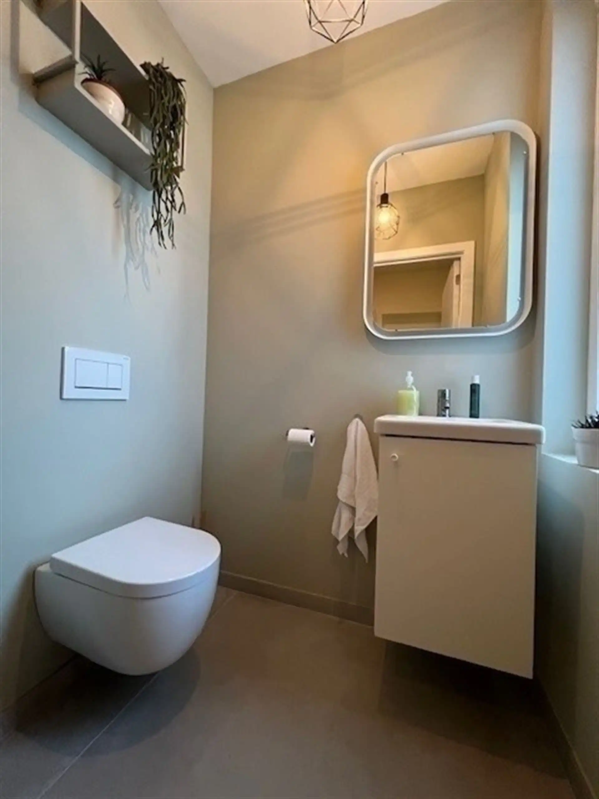 Instapklare alleenstaande woning met grote tuin in hartje Breendonk! foto 11